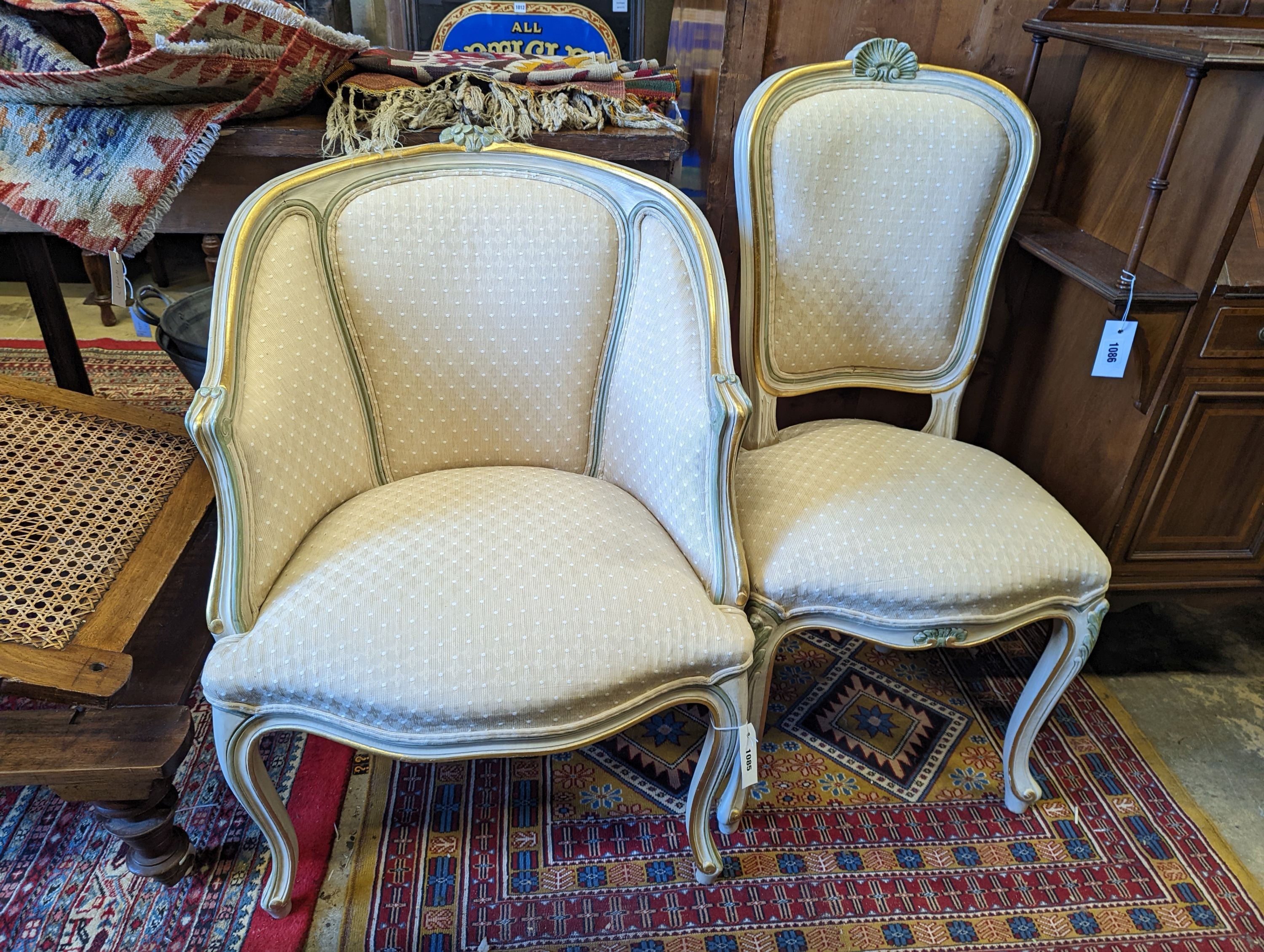 A Louis XVI style painted upholstered tub chair and a similar side chair